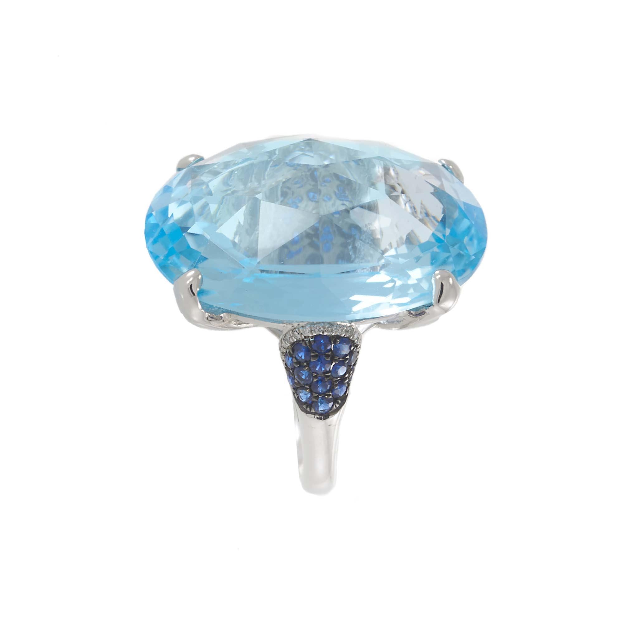 Oval Blue Topaz, Sapphire, and Diamond Ring in 18KT White Gold