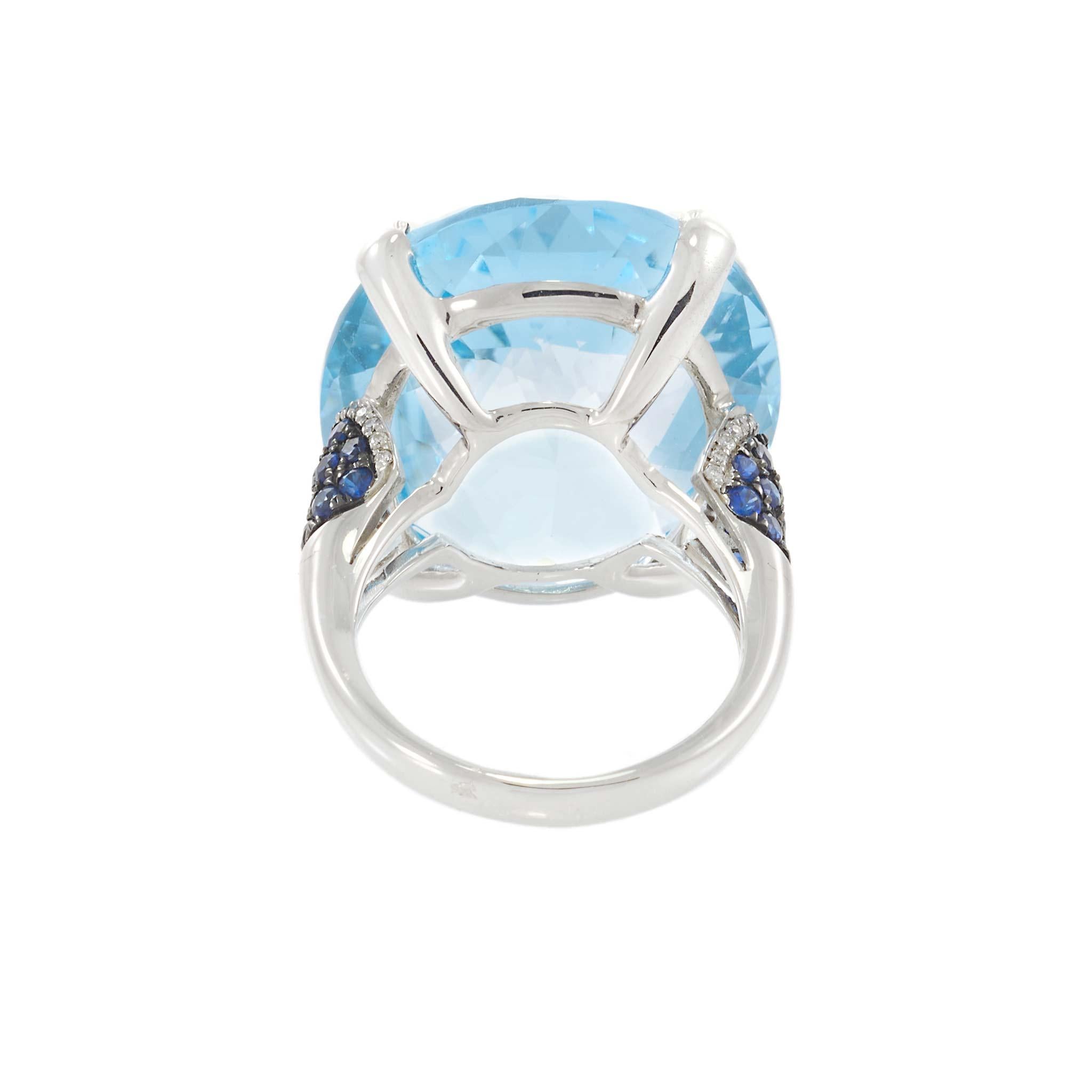 Oval Blue Topaz, Sapphire, and Diamond Ring in 18KT White Gold
