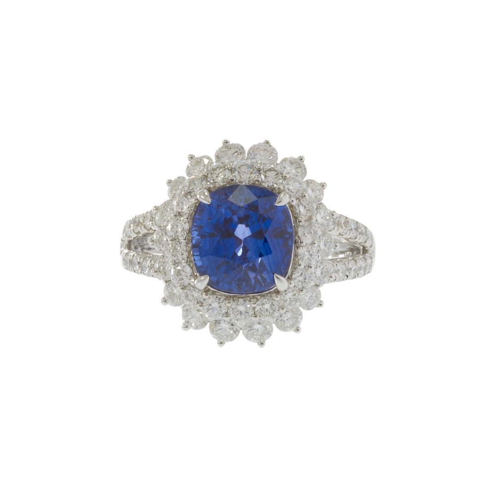 18KT White Gold 4.89CT Sapphire and 2.14CT Diamond Cluster Ring