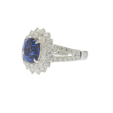 18KT White Gold 4.89CT Sapphire and 2.14CT Diamond Cluster Ring