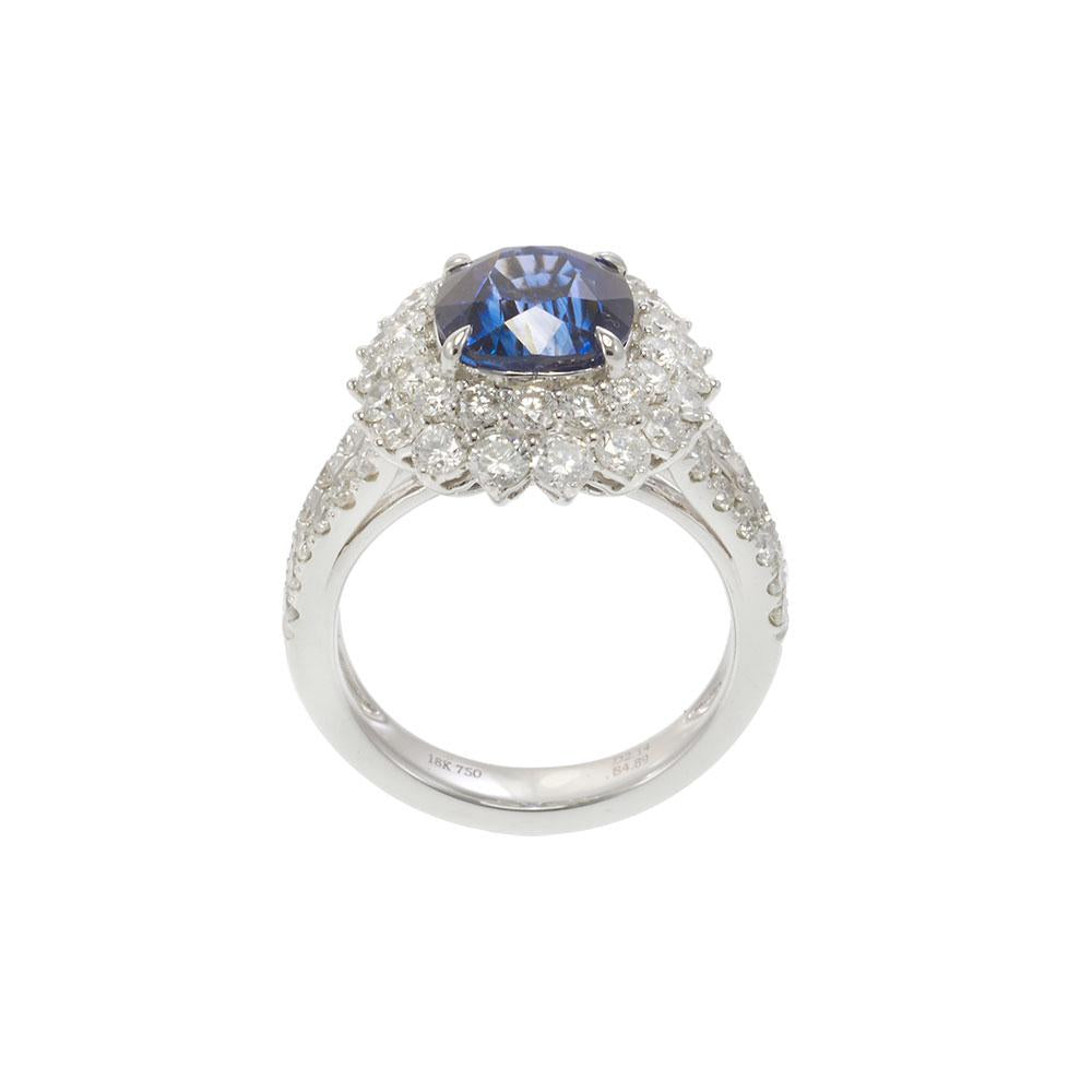 18KT White Gold 4.89CT Sapphire and 2.14CT Diamond Cluster Ring
