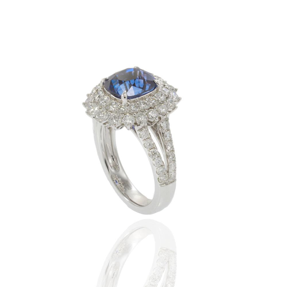 18KT White Gold 4.89CT Sapphire and 2.14CT Diamond Cluster Ring