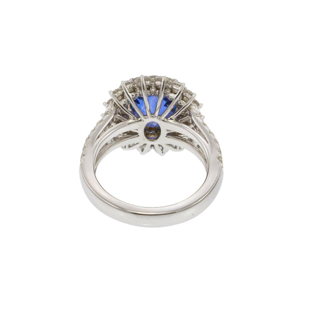 18KT White Gold 4.89CT Sapphire and 2.14CT Diamond Cluster Ring