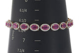 14KT Rose Gold Oval Ruby and Diamond Halo Bracelet