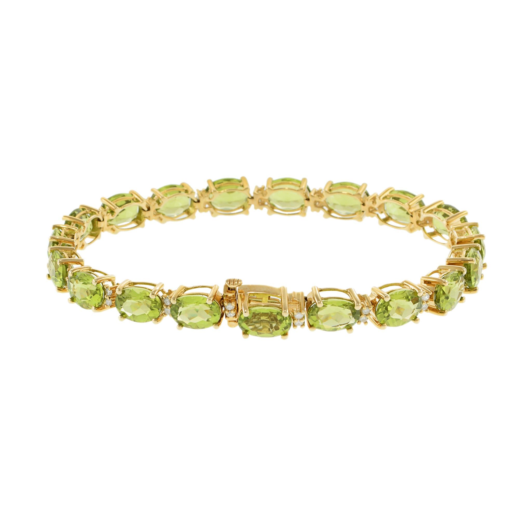14KT Yellow Gold Bracelet with Oval Peridots and Round Cut Diamonds