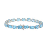 14KT White Gold Oval Blue Topaz and Diamond Bracelet