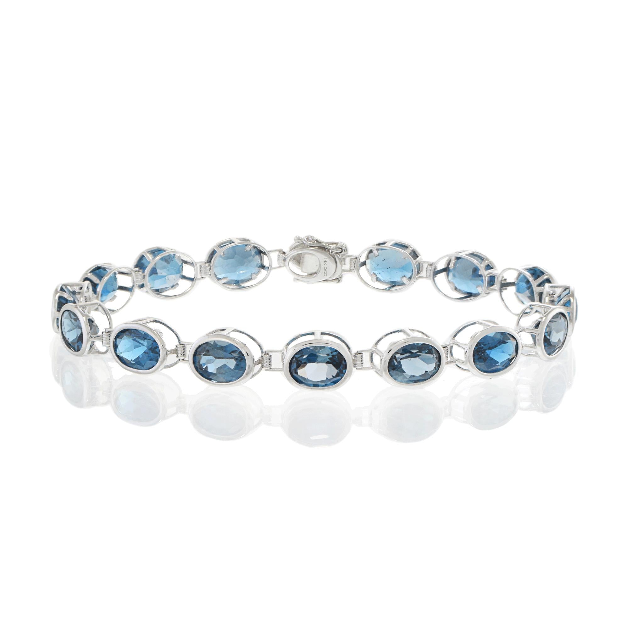 4KT White Gold Oval London Blue Topaz Bracelet