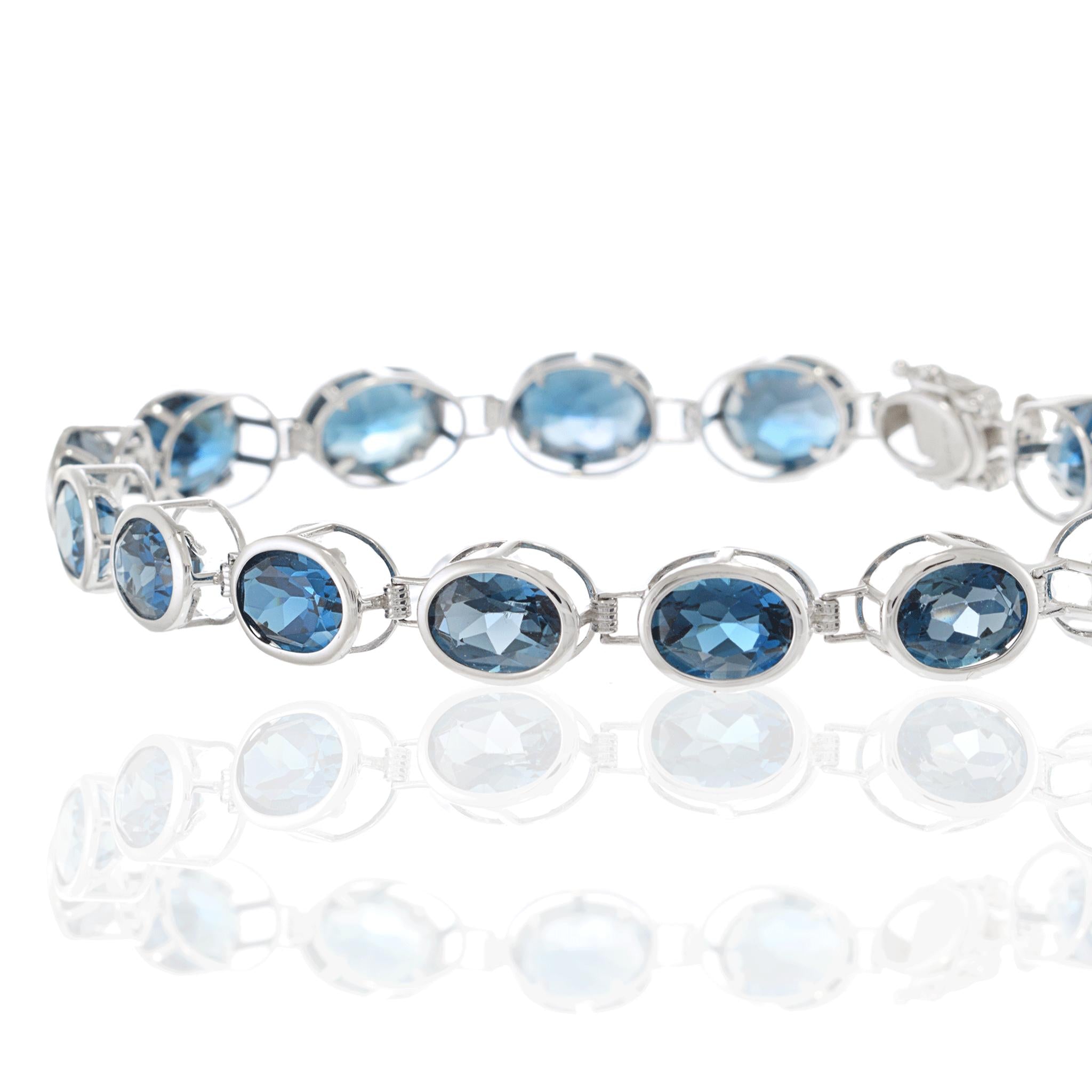 4KT White Gold Oval London Blue Topaz Bracelet