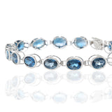 4KT White Gold Oval London Blue Topaz Bracelet