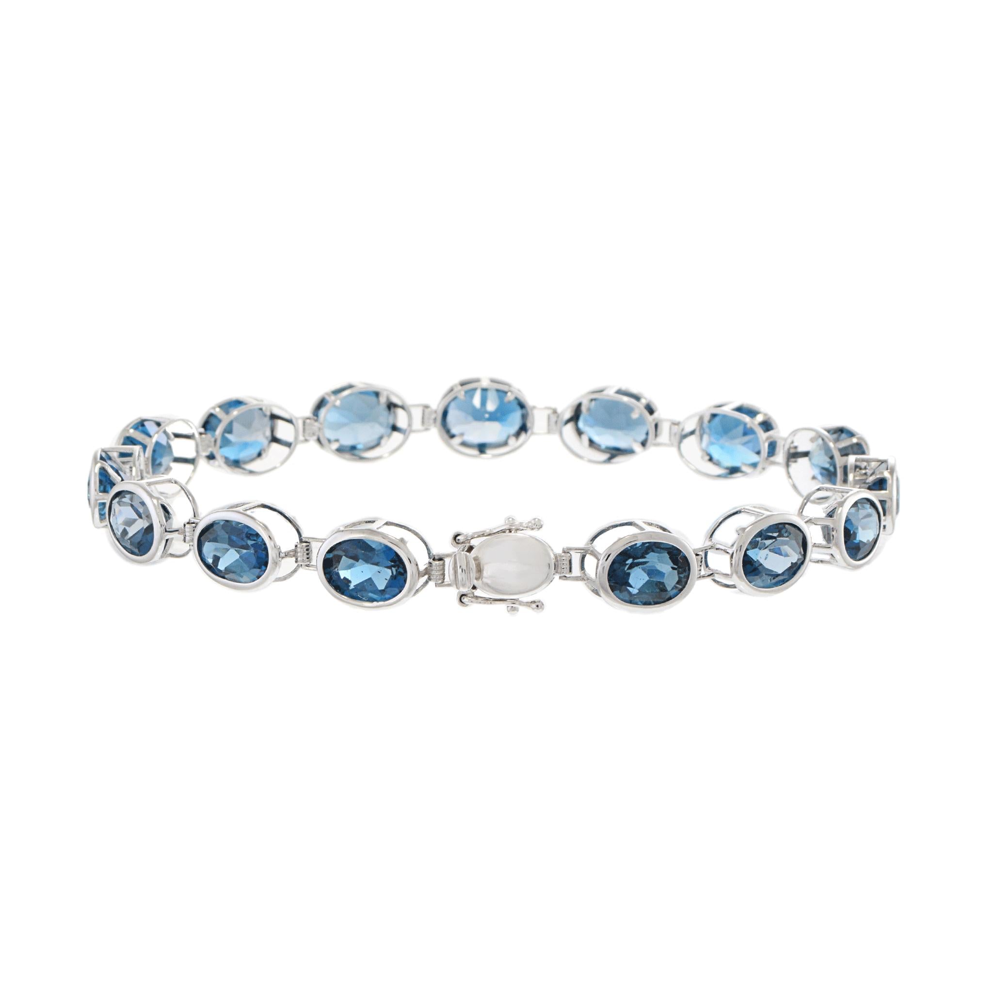4KT White Gold Oval London Blue Topaz Bracelet
