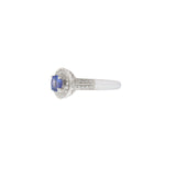 14KT White Gold Tanzanite and Diamond Halo Ring