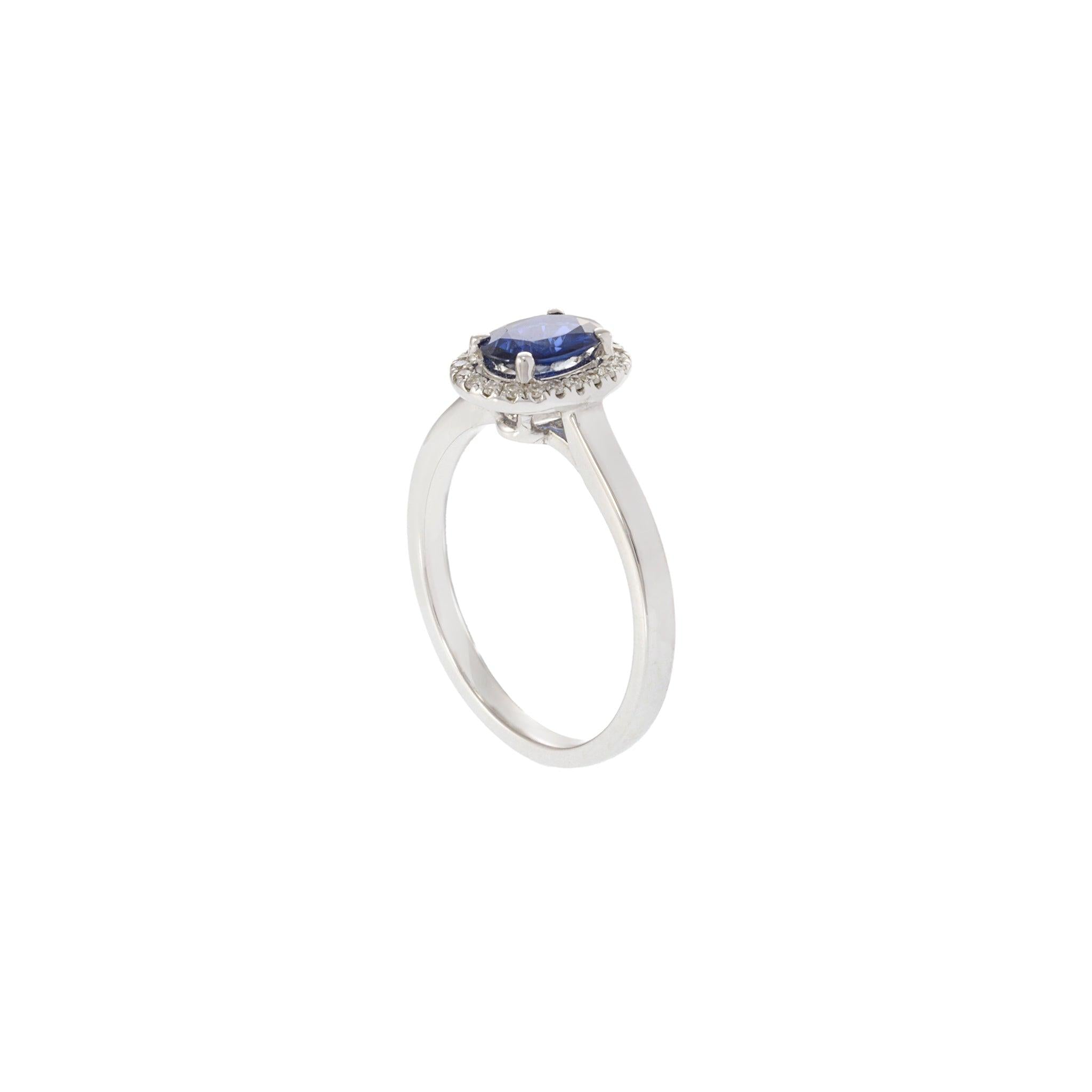18KT White Gold Oval Sapphire and Diamond Halo Ring