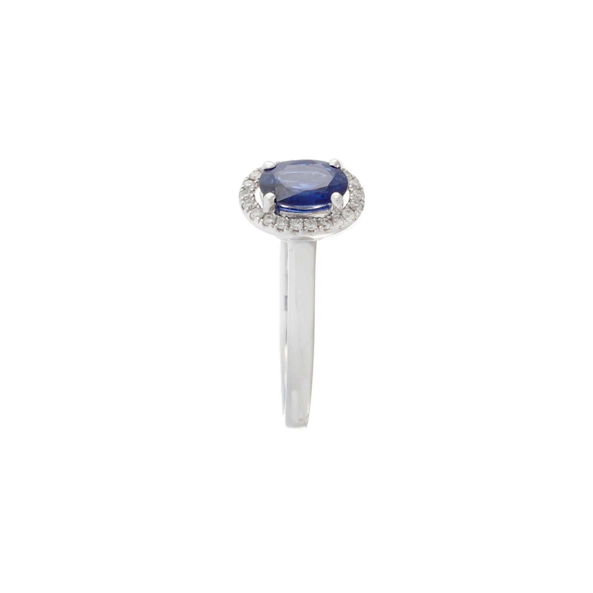 18KT White Gold Oval Sapphire and Diamond Halo Ring