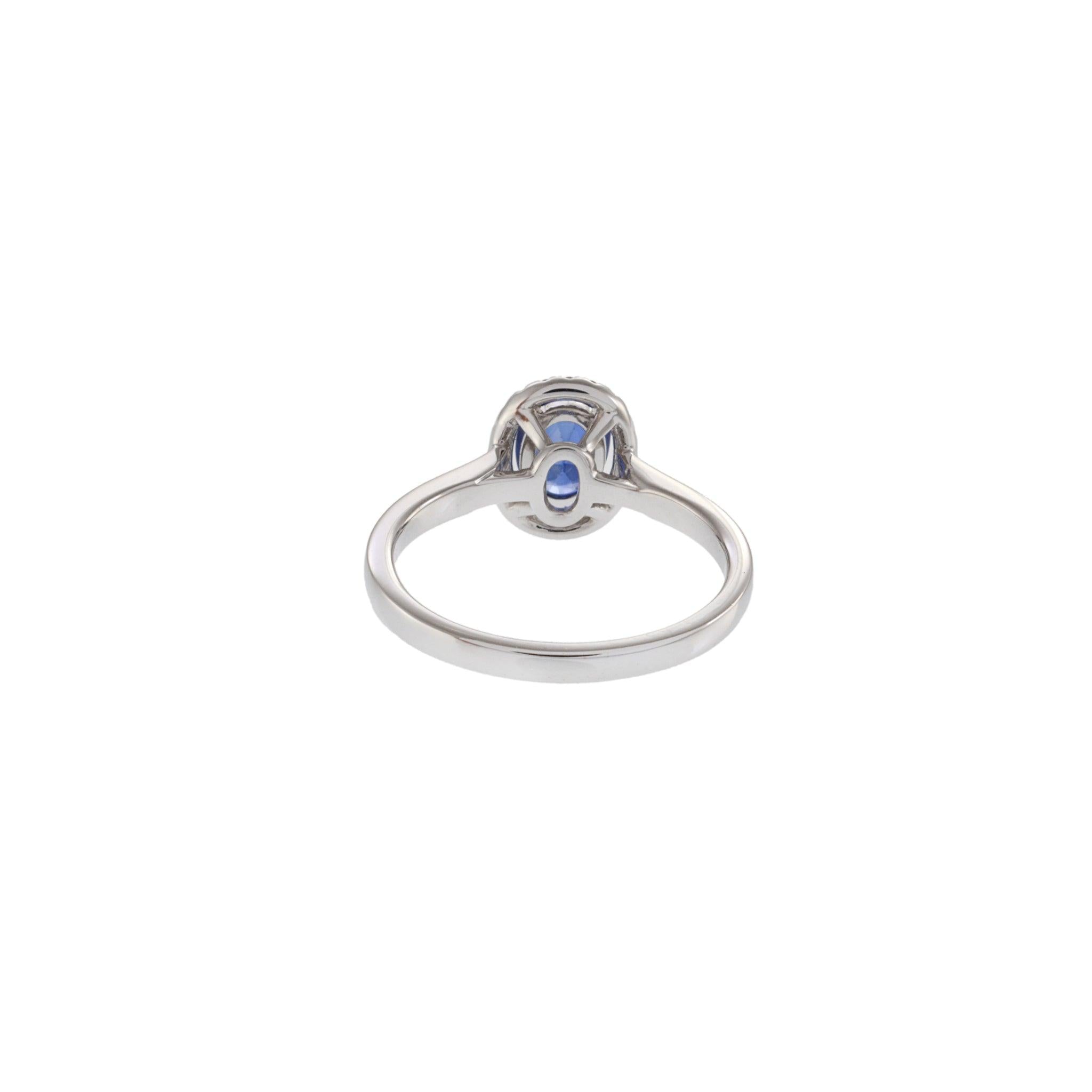 18KT White Gold Oval Sapphire and Diamond Halo Ring