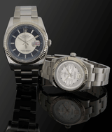 Two rolex watches with reflective surfaces on a black background
