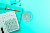Jewelry appraisal report concept with calculator, notepad, and diamond ring used for insurance valuation