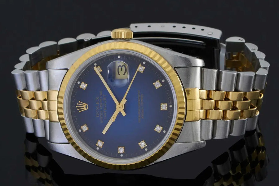Vintage Rolex Datejust Ref. 16233 36mm with factory vignette blue diamond dial, two tone Jubilee bracelet and fluted gold bezel