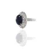 18KT White Gold Cabochon Cut Blue Sapphire And Diamond Ring