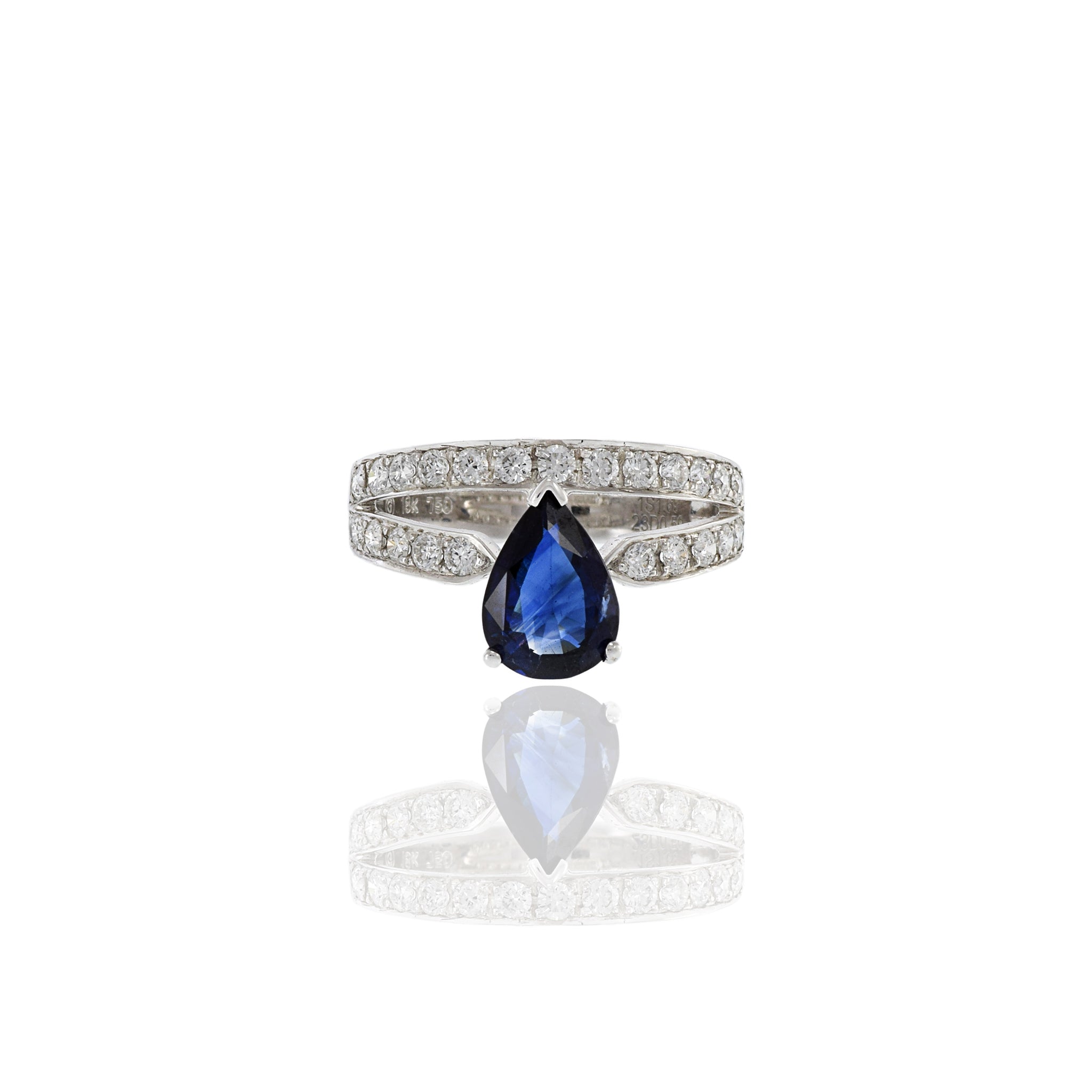 18KT White Gold Blue Sapphire And Diamond Ring