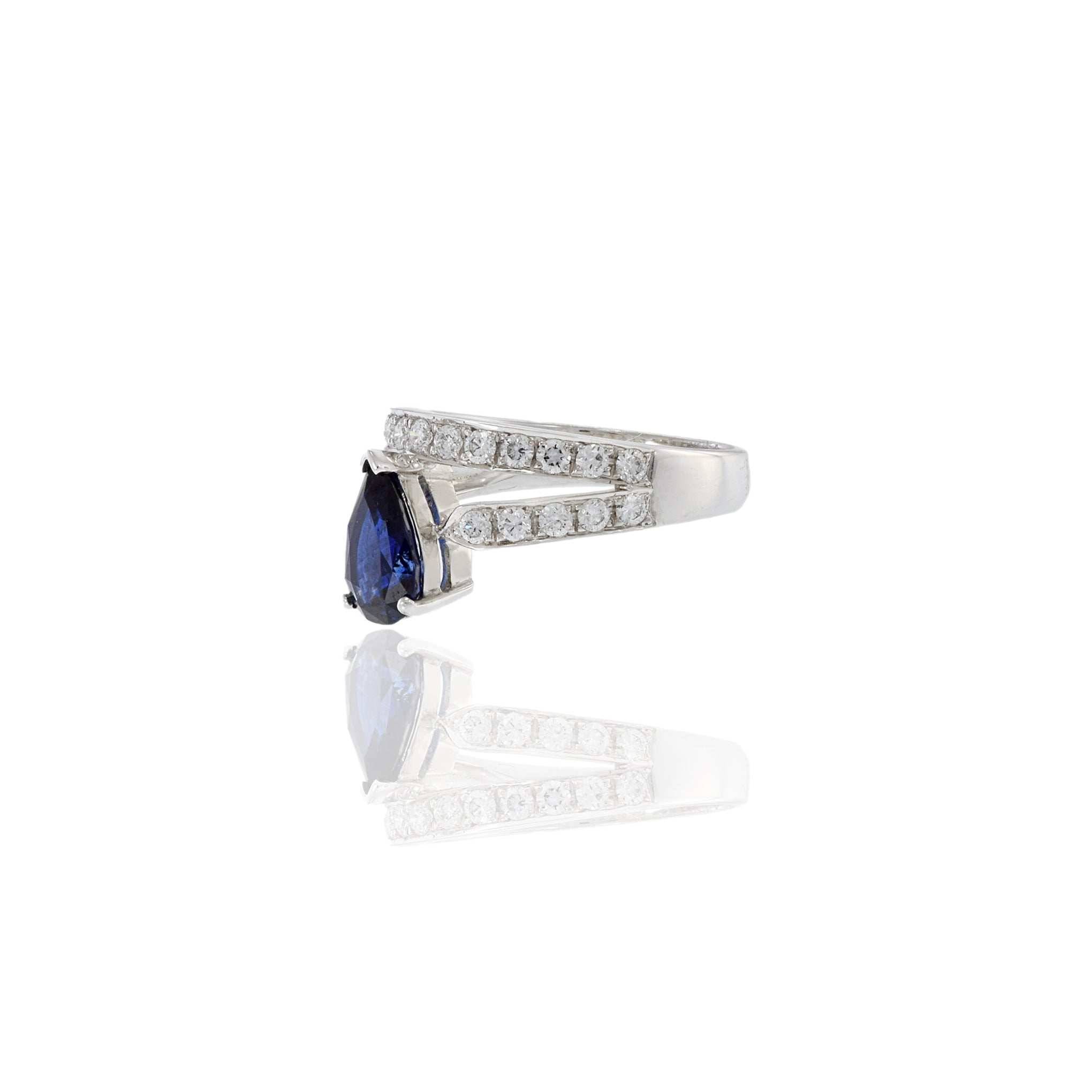 18KT White Gold Blue Sapphire And Diamond Ring