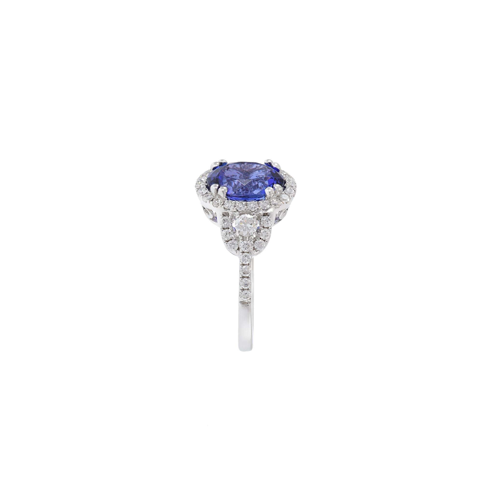 18KT White Gold Oval Cut Tanzanite And Diamond Ring