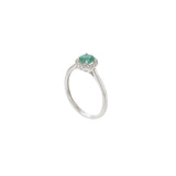 18KT White Gold Round Cut Diamond and Emerald Ring