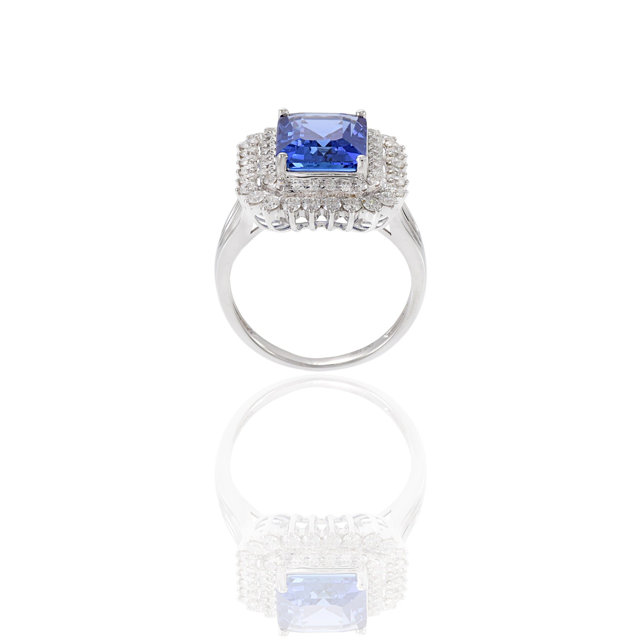 18KT White Gold Emerald Cut Tanzanite And Diamond Ring