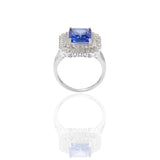 18KT White Gold Emerald Cut Tanzanite And Diamond Ring