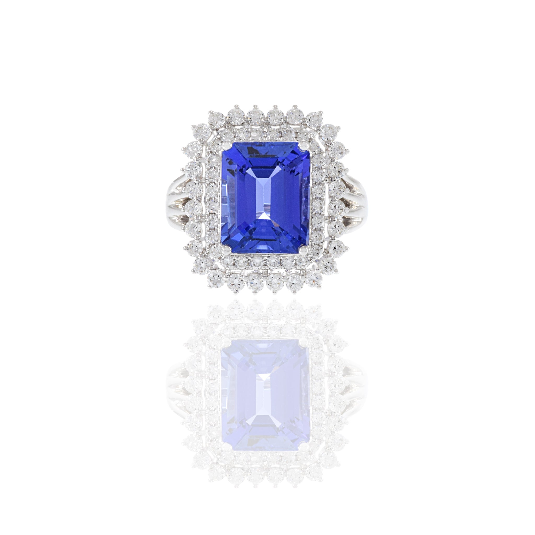 18KT White Gold Emerald Cut Tanzanite And Diamond Ring