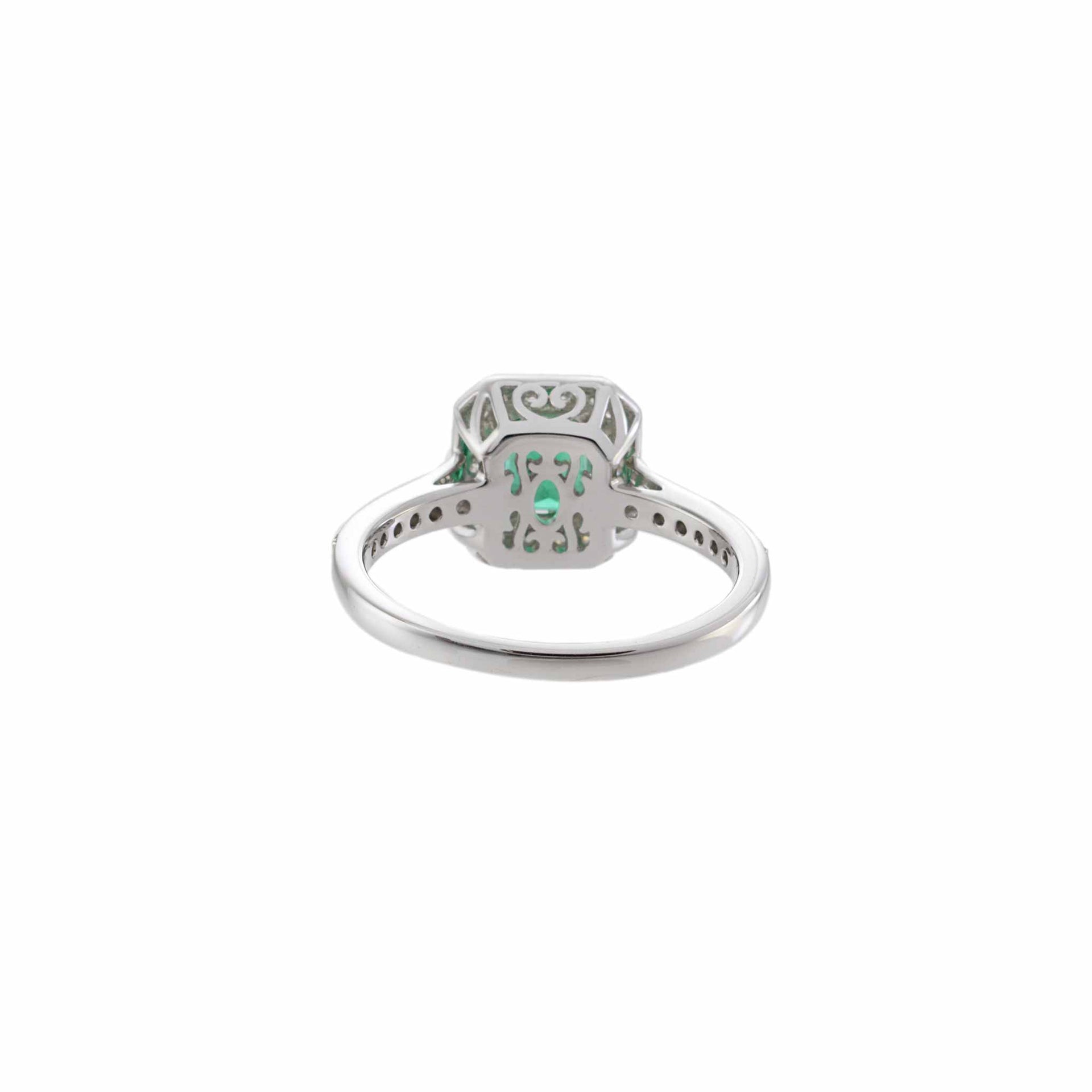 18KT White Gold Emerald and Diamond Halo Ring