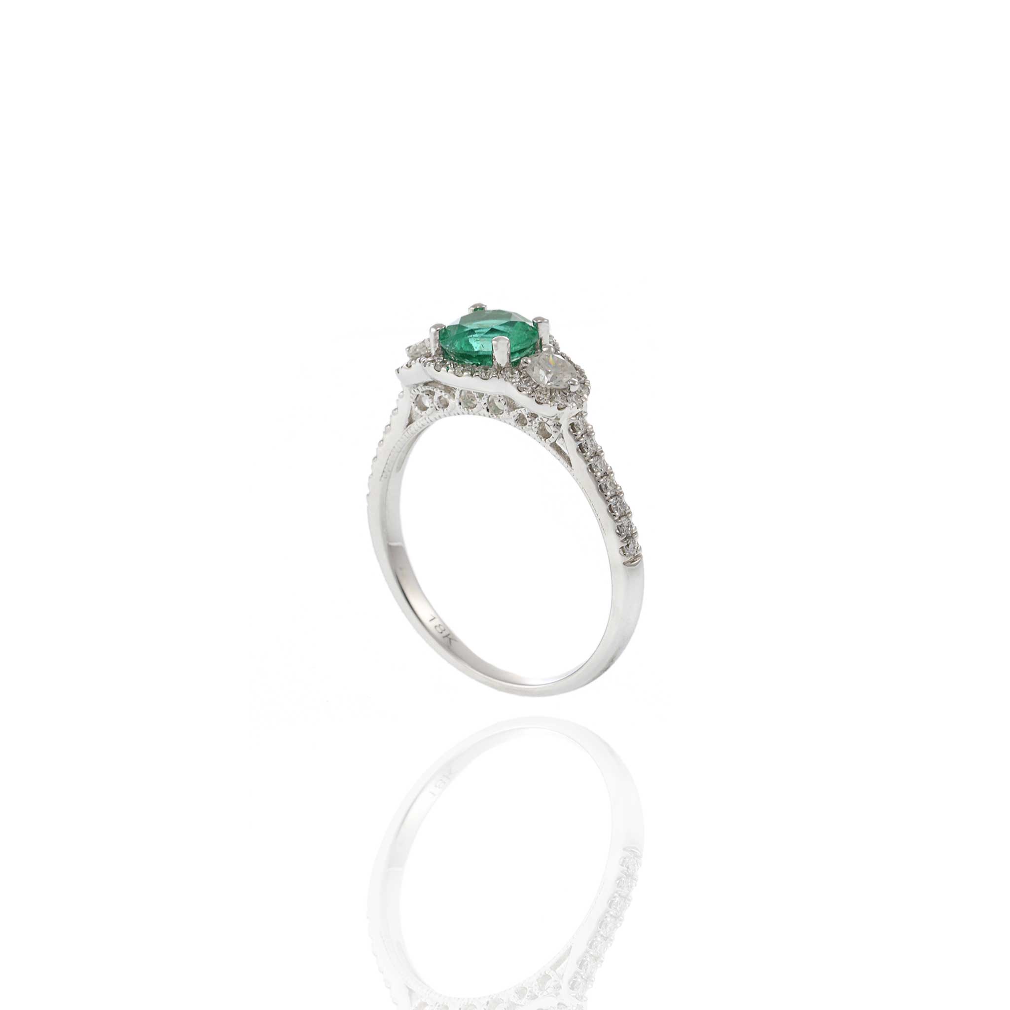 18KT White Gold Emerald and Diamond Ring