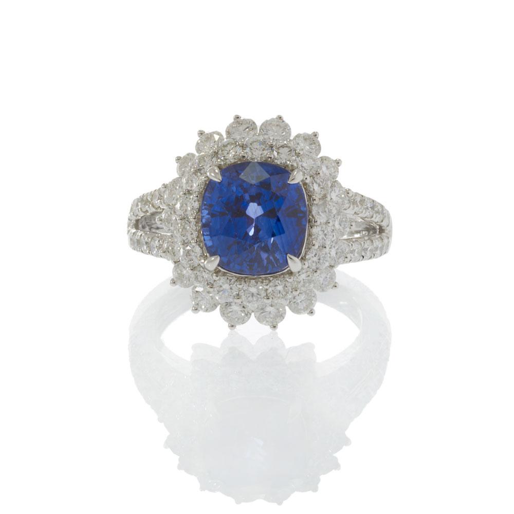 18KT White Gold 4.89CT Sapphire and 2.14CT Diamond Cluster Ring
