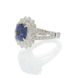 18KT White Gold 4.89CT Sapphire and 2.14CT Diamond Cluster Ring