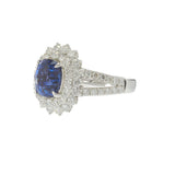 18KT White Gold 4.89CT Sapphire and 2.14CT Diamond Cluster Ring