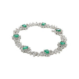 18kt White Gold Emerald Bracelet with Diamonds