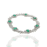 18kt White Gold Emerald Bracelet with Diamonds