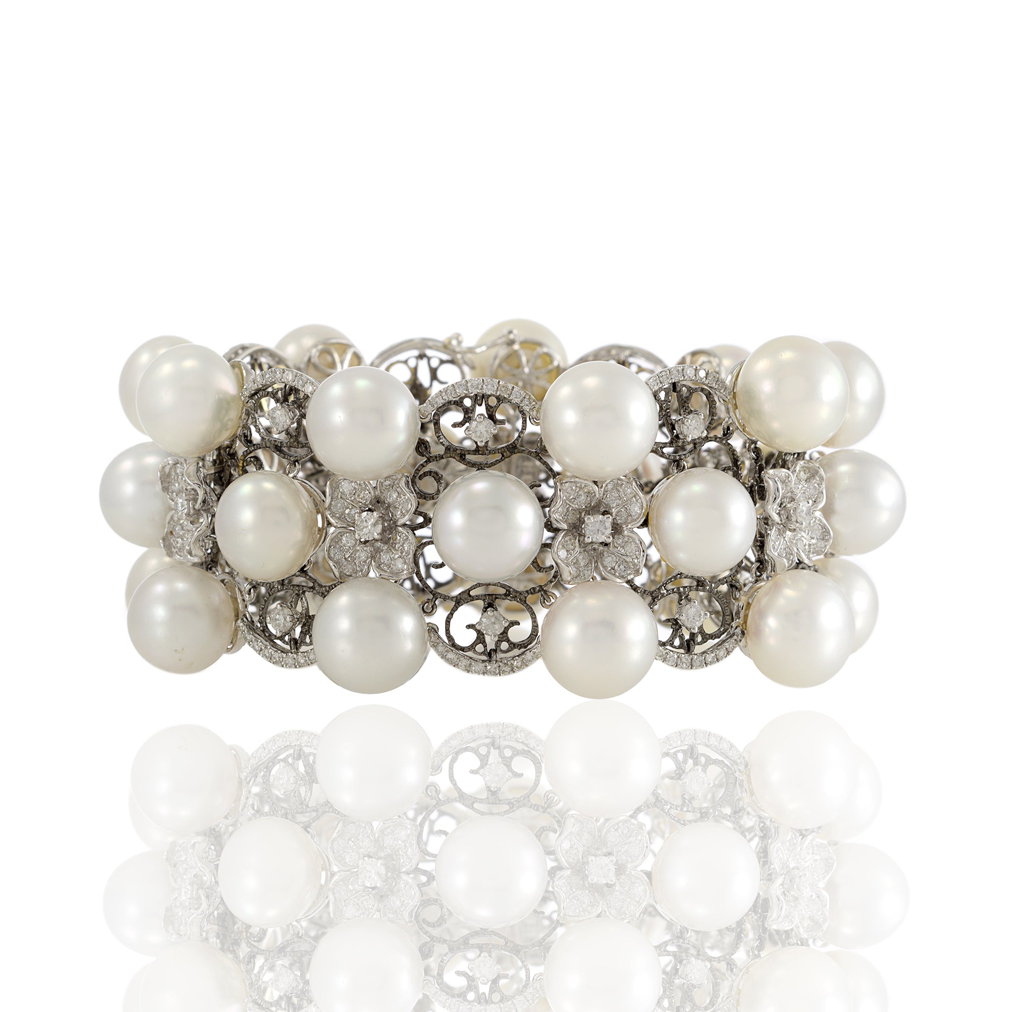 18kt White Gold, South Sea Pearl, and Diamond Three Row Bracelet with Flowers