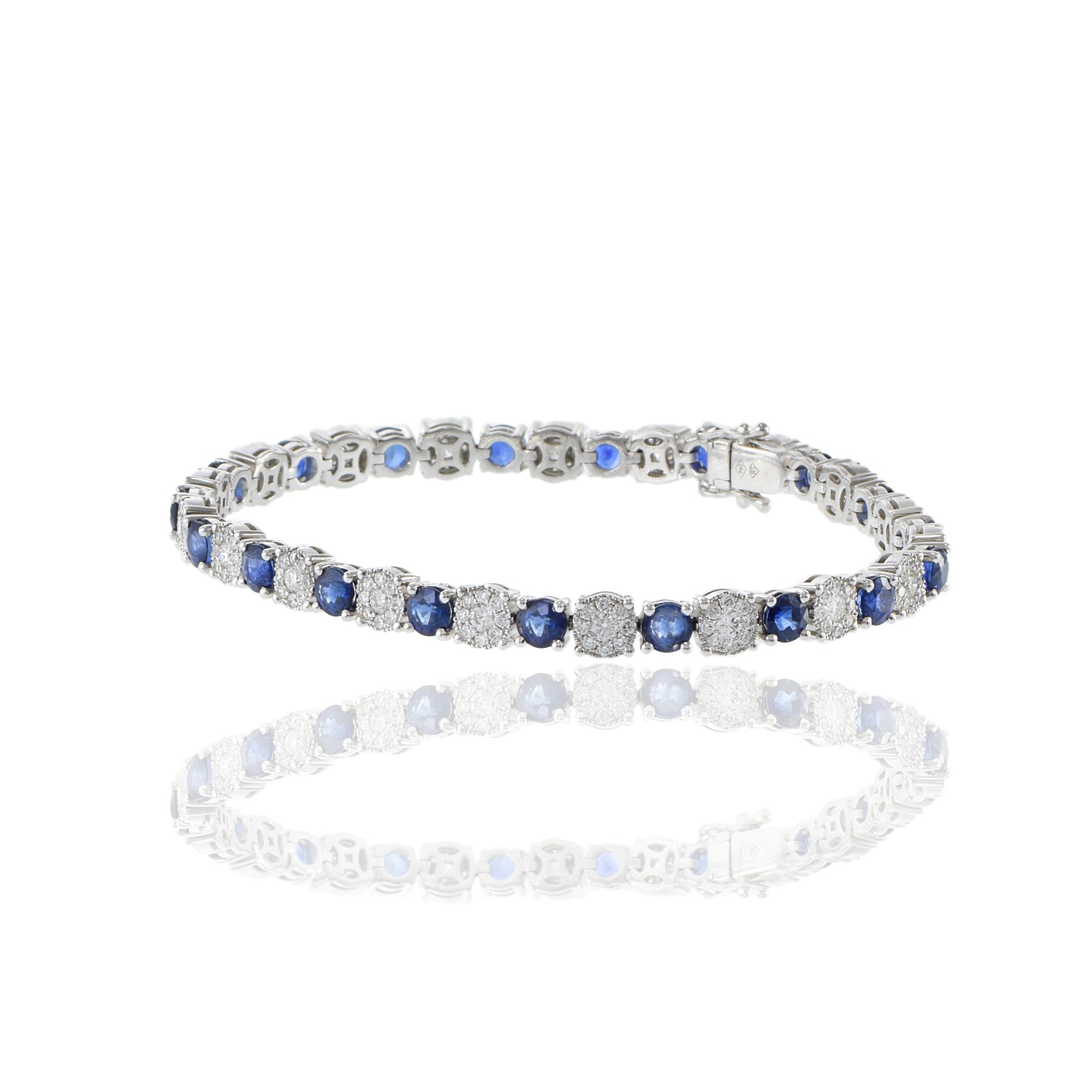18KT White Gold Round Cut Sapphire And Cluster Diamond Bracelet