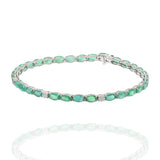 18KT White Gold Oval Emerald and Diamond Tennis Bracelet – 7" Inch