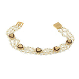 Vintage “Lucien Piccard” Triple Strand Pearl Bracelet with Garnet Hearts