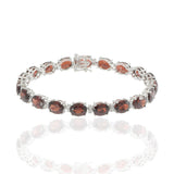 14KT White Gold Garnet and Diamond Oval Link Bracelet