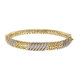 14KT Yellow Gold With Round Cut Diamonds Swirl Design With Eyelet Detailing Bangle