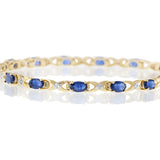 14KT Yellow Gold Bracelet with Round Cut Diamonds and Oval Sapphires