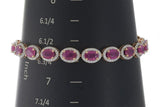 14KT Rose Gold Oval Ruby and Diamond Halo Bracelet