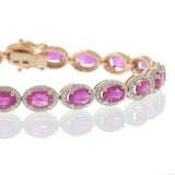 14KT Rose Gold Oval Ruby and Diamond Halo Bracelet