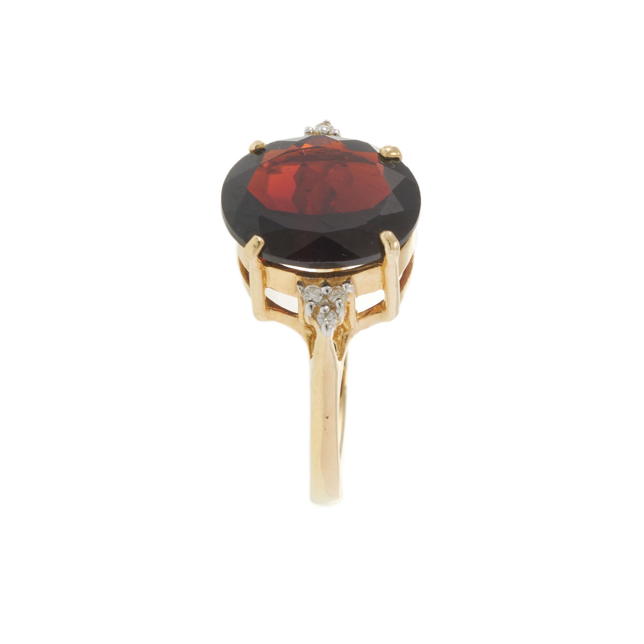 14KT Yellow Gold 4.77CT Oval Garnet and Diamond Ring