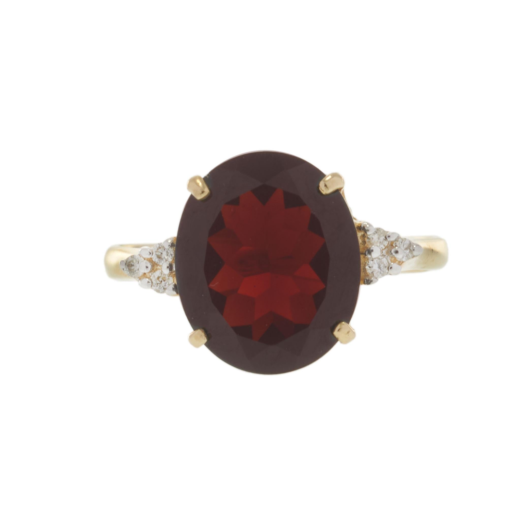 14KT Yellow Gold 4.77CT Oval Garnet and Diamond Ring