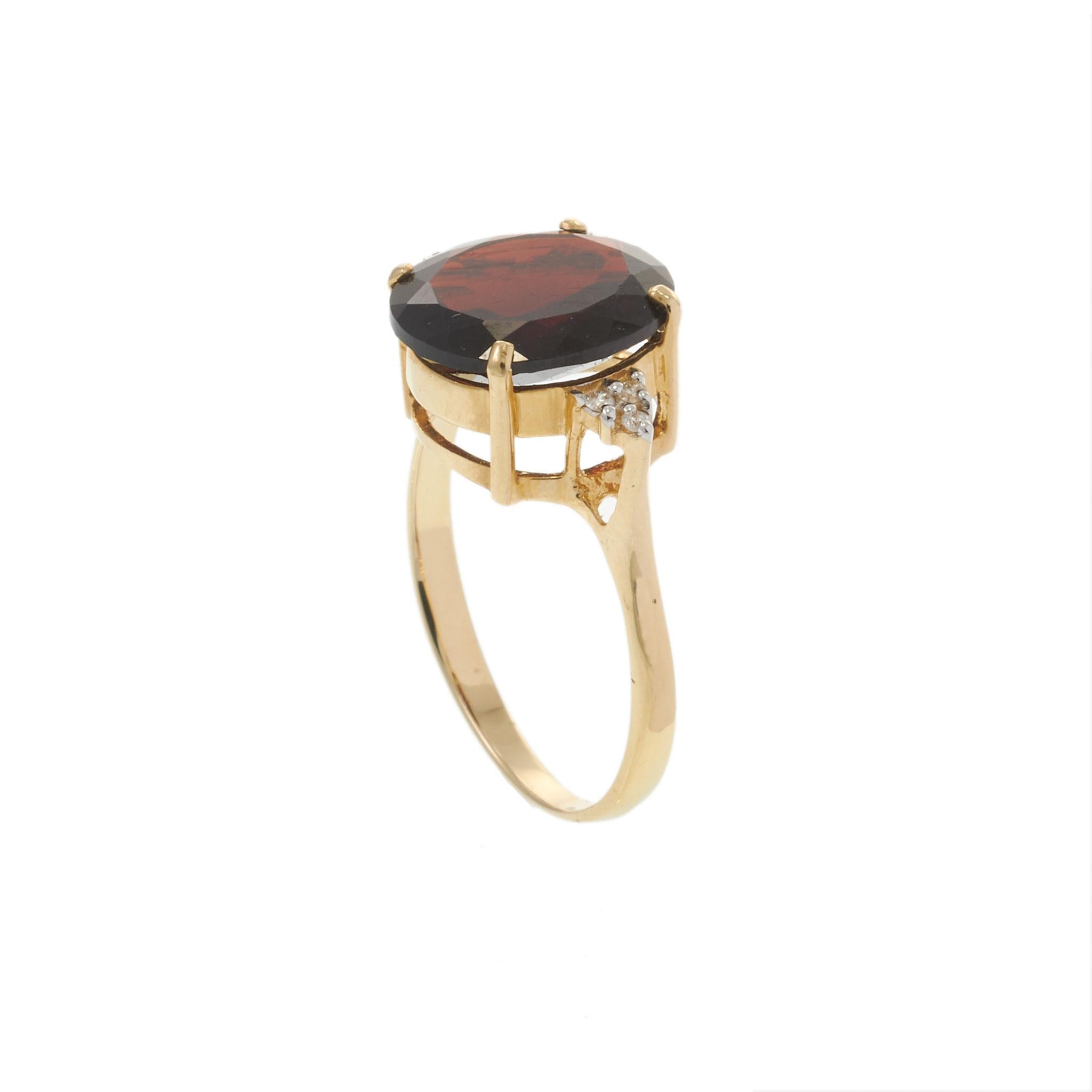 14KT Yellow Gold 4.77CT Oval Garnet and Diamond Ring