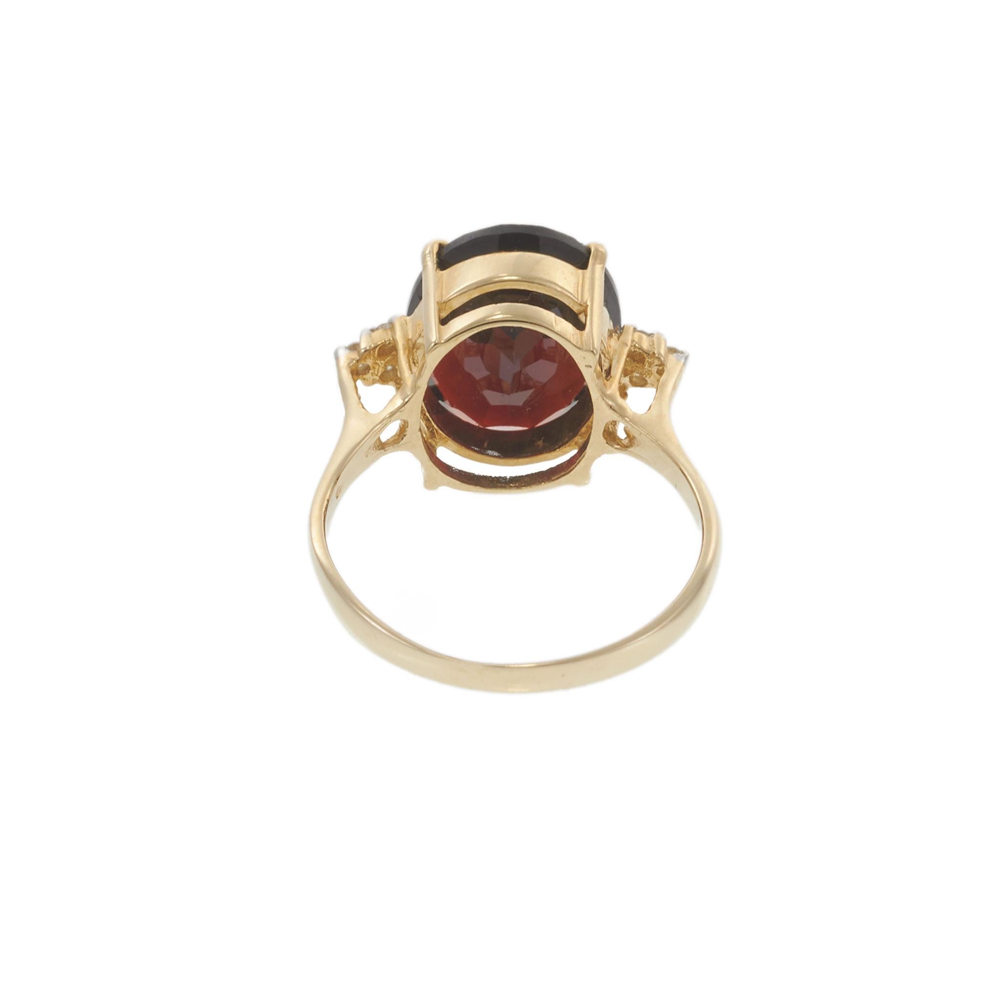 14KT Yellow Gold 4.77CT Oval Garnet and Diamond Ring