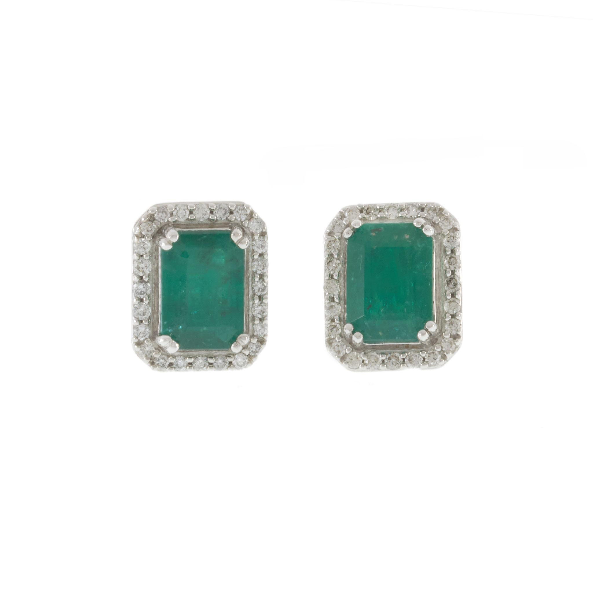 14KT White Gold Emerald Cut Emerald and Diamond Halo Stud Earrings